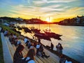 Porto, Portugal Ã¢â¬â May 2, 2019: People enjoying sunset in the ancient popular city Porto. Royalty Free Stock Photo